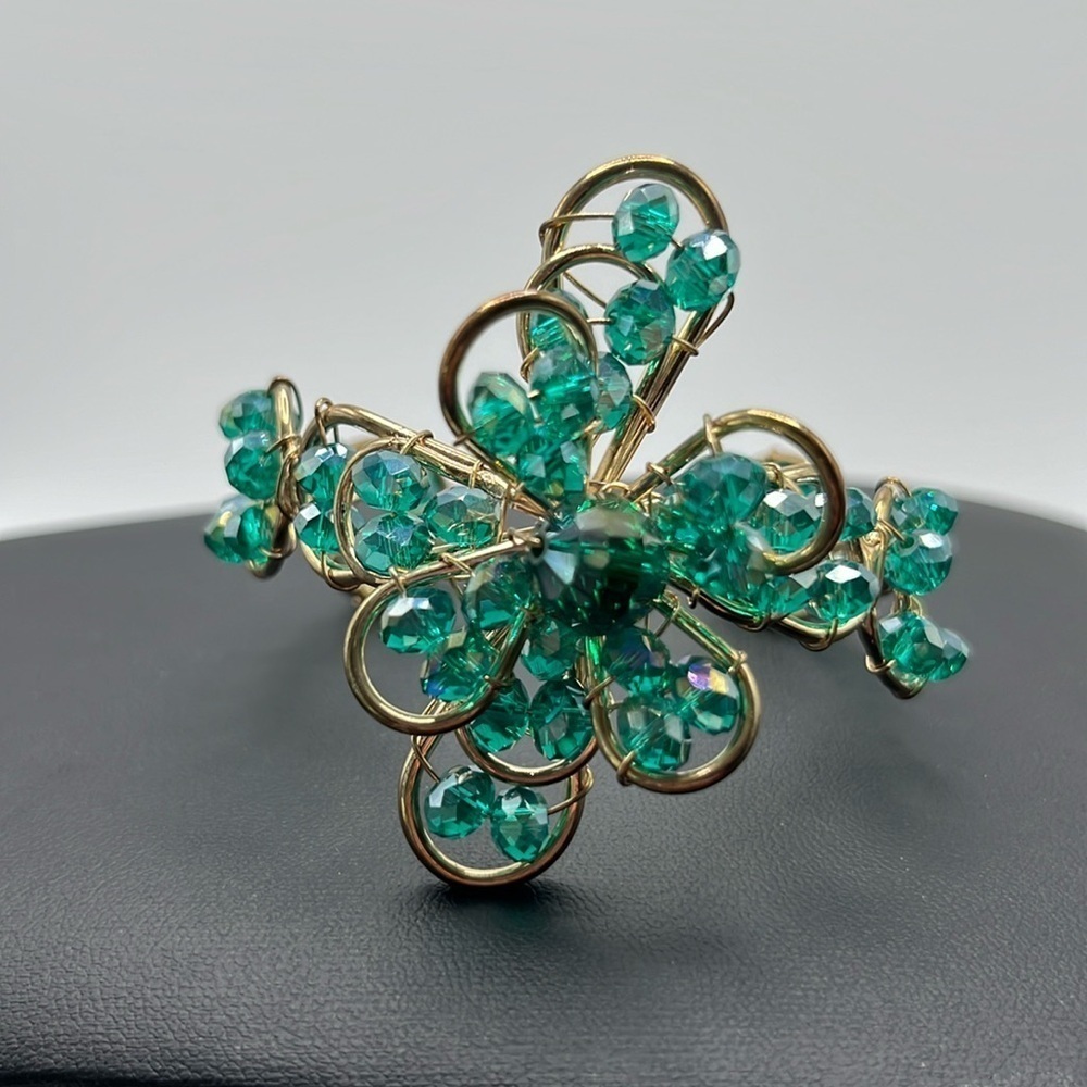 Beautiful teal green sparkly aurora borealis iridescent beaded flower bracelet